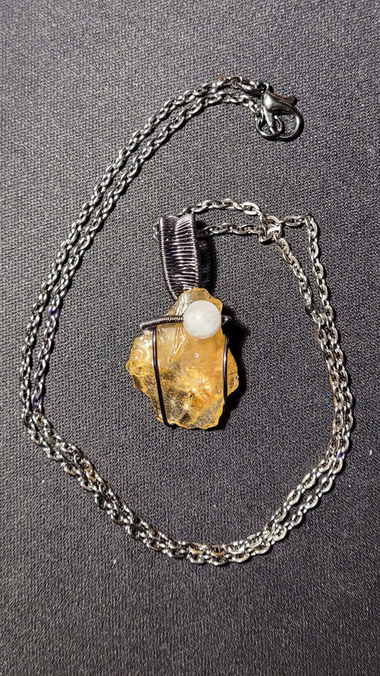 Pendentif tressé Ambre et Pierre de Lune