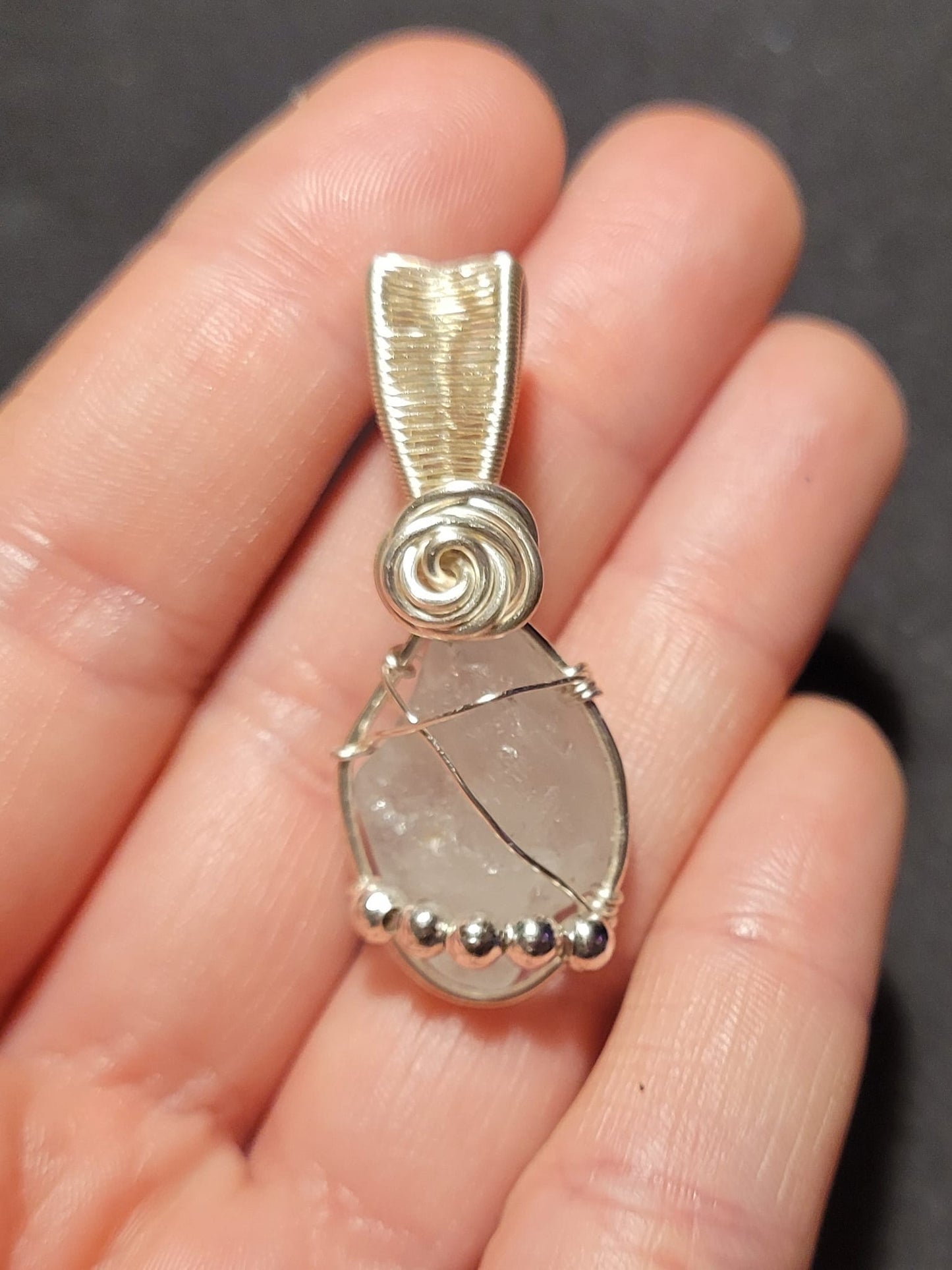 Blue Topaz pendant and its rose