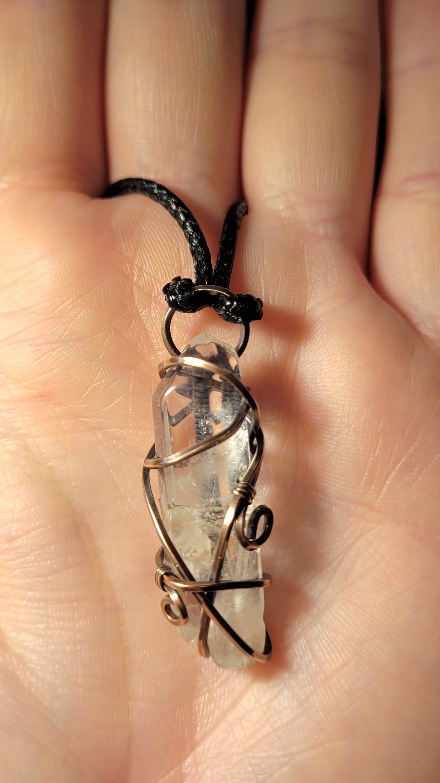 Quartz Point pendant (crossed) and raw copper