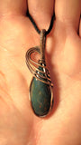 Bloodstone and raw copper pendant