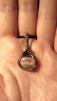 Rhodonite pendant (oval) and raw copper